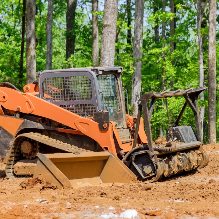 Heavy tractor machinery align the land for construction site